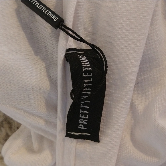 NWT. Pretty Little Things white bodysuit. - Picture 3 of 9